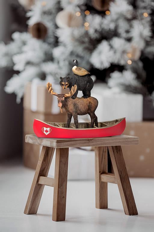 Stacked Winter Animals in Canoe - Image 2
